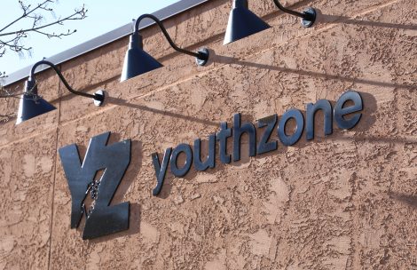 The sign for YouthZone on its Glenwood Springs building.