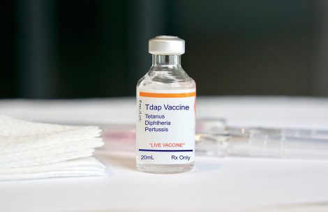 Tdap Vaccine in a glass vial for tetanus, diphtheria, and pertussis.