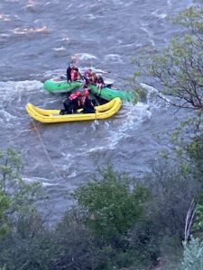 Rafters are stranded on a rock in the Roaring Fork River near Glenwood Springs on Tuesday, May 17, 2022. 