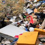 Trash, shelters removed from Glenwood Springs homeless camp