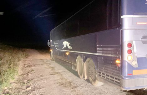 A disabled Greyhound bus on Coffee Pot Road.