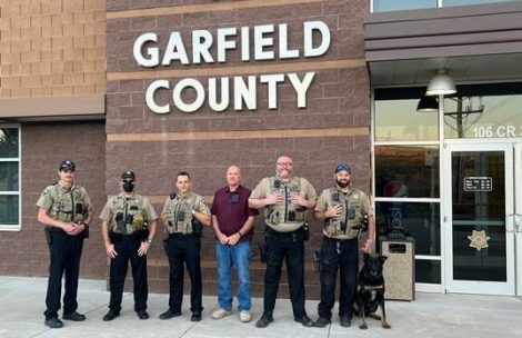 Members of the Garfield County Sheriff's Office display the new body-worn cameras in front of the sheriff's office in Glenwood Springs.