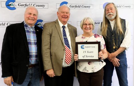 The Garfield County Commissioners pose with Elections Clerk Brenda Quinty at the 2022 employee service awards celebration in Glenwood Springs.