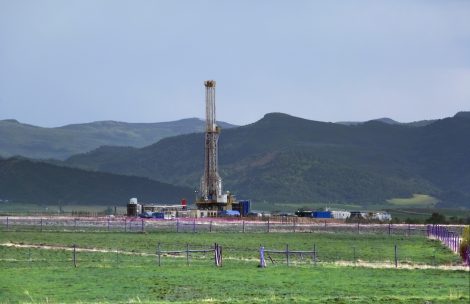 Oil rig near pristine pastures in western Garfield County, Colorado