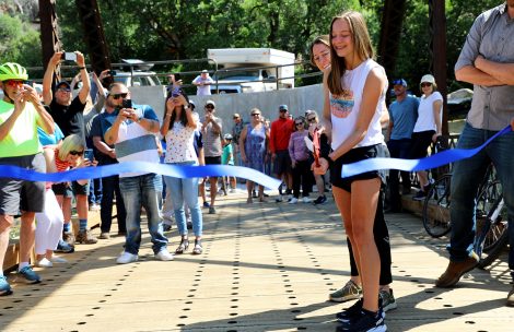 : Jane Taylor, daughter of Janis and Rod Taylor, cuts a ribbon on the Hardwick Bridge officially opening the Hardwick Bridge Trail south of Glenwood Springs.