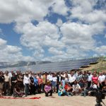 Organizers of a large community-owned solar farm celebrate its grand opening
