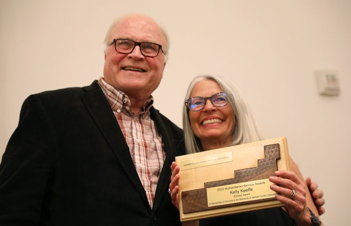 Kelly Keeffe receives the Pioneer Award at the 2023 Garfield County Humanitarian Awards celebration in Glenwood Springs on April 3, 2023.