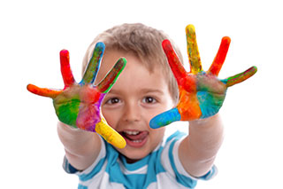 kid with painted hands